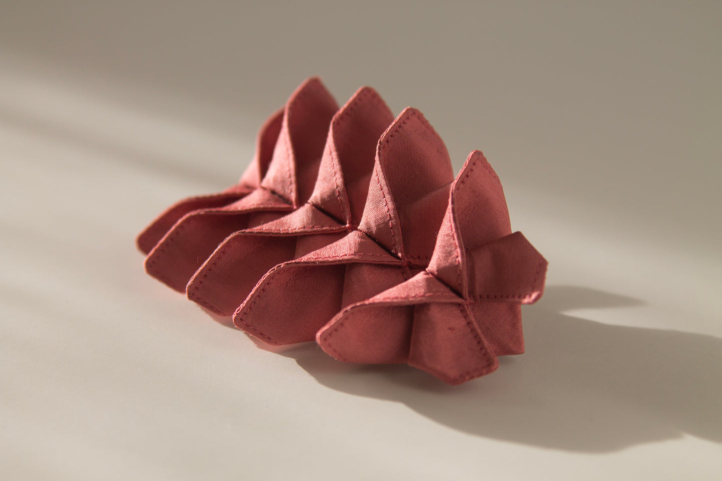Origami Silk Butterfly Barrette Hair Clip in Light Pink on white background.