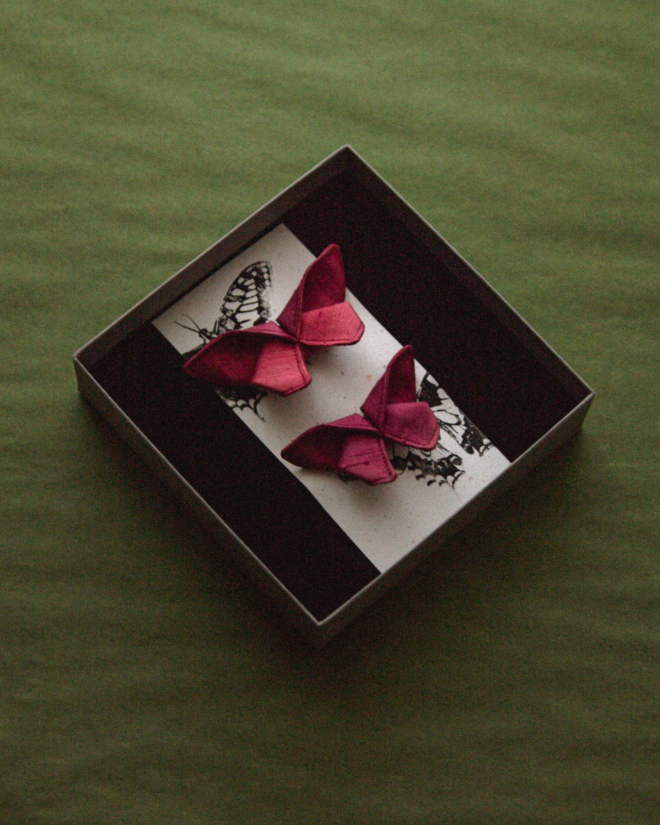 The two small hair clips is delivered in a beautiful jewelry box with our logo embossed on the lid.