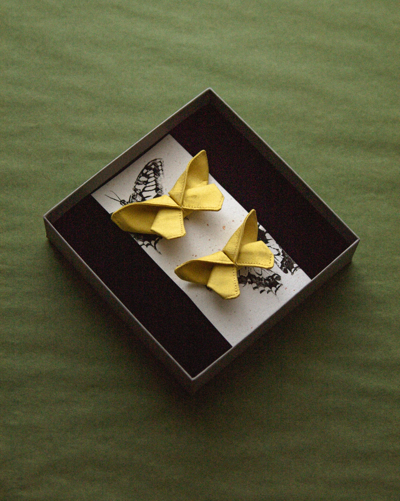 The two small hair clips is delivered in a beautiful jewelry box with our logo embossed on the lid.