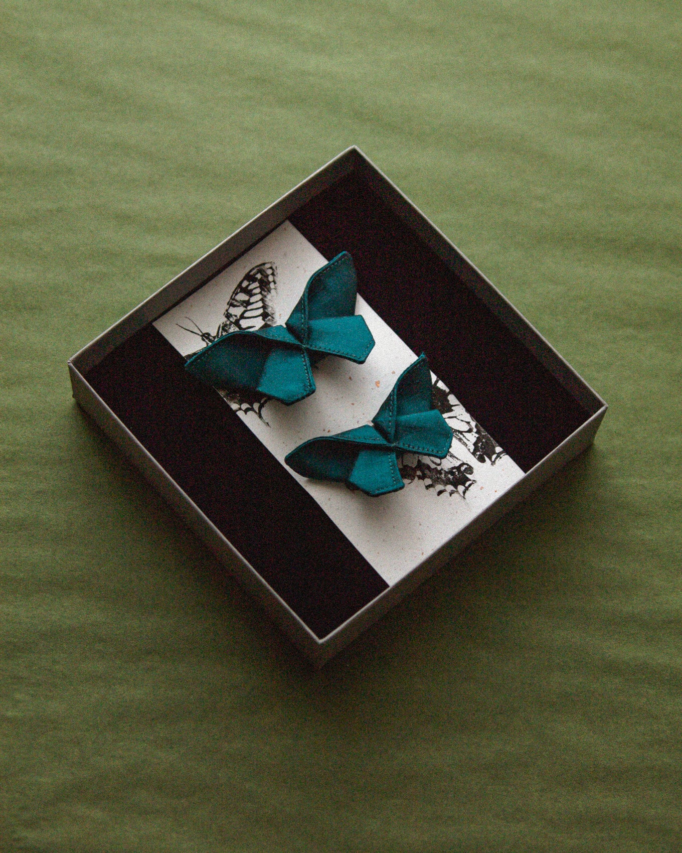 The two small hair clips is delivered in a beautiful jewelry box with our logo embossed on the lid.