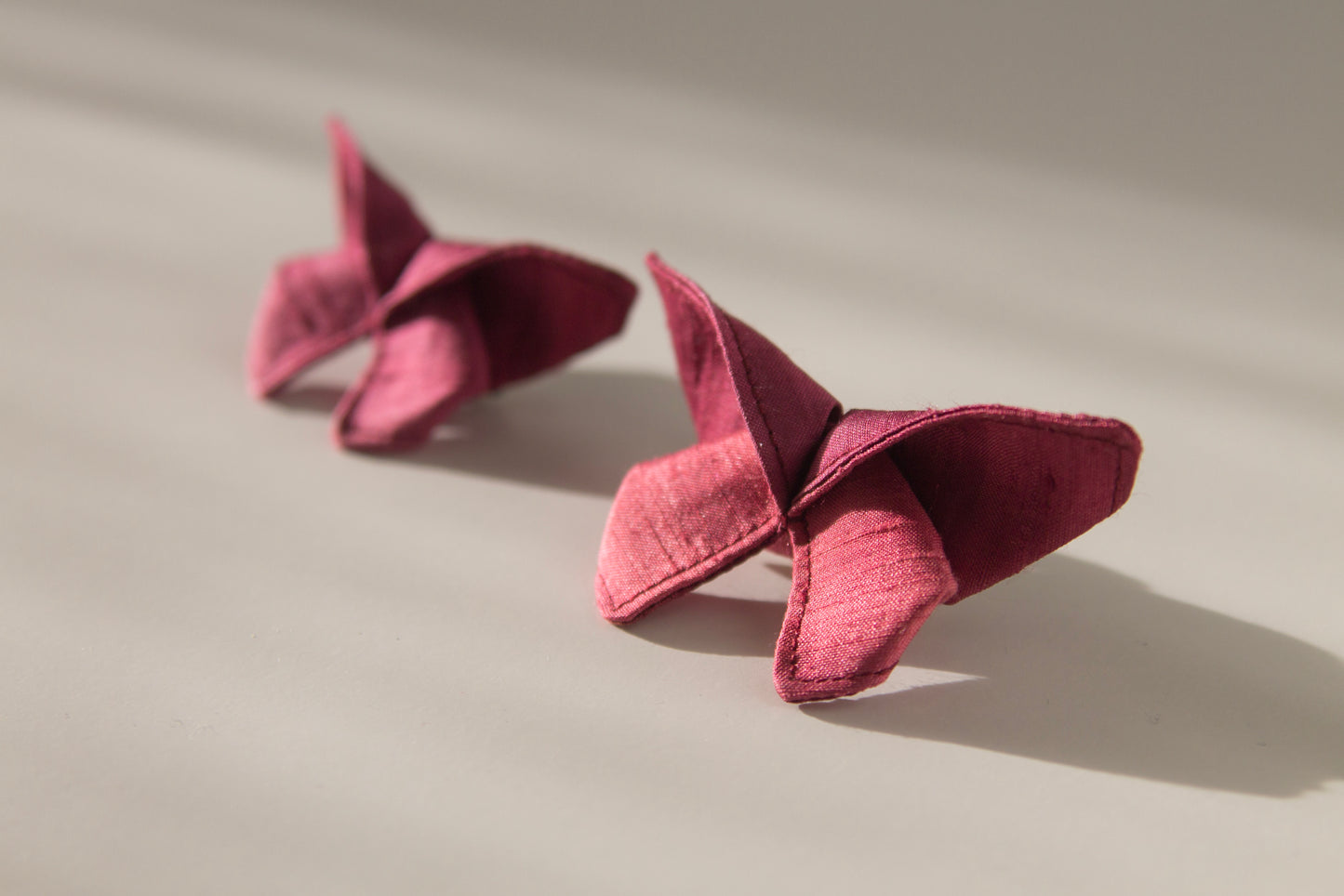 Origami Silk Butterfly Hair Clips in Gradient Pink & Purple on white background.