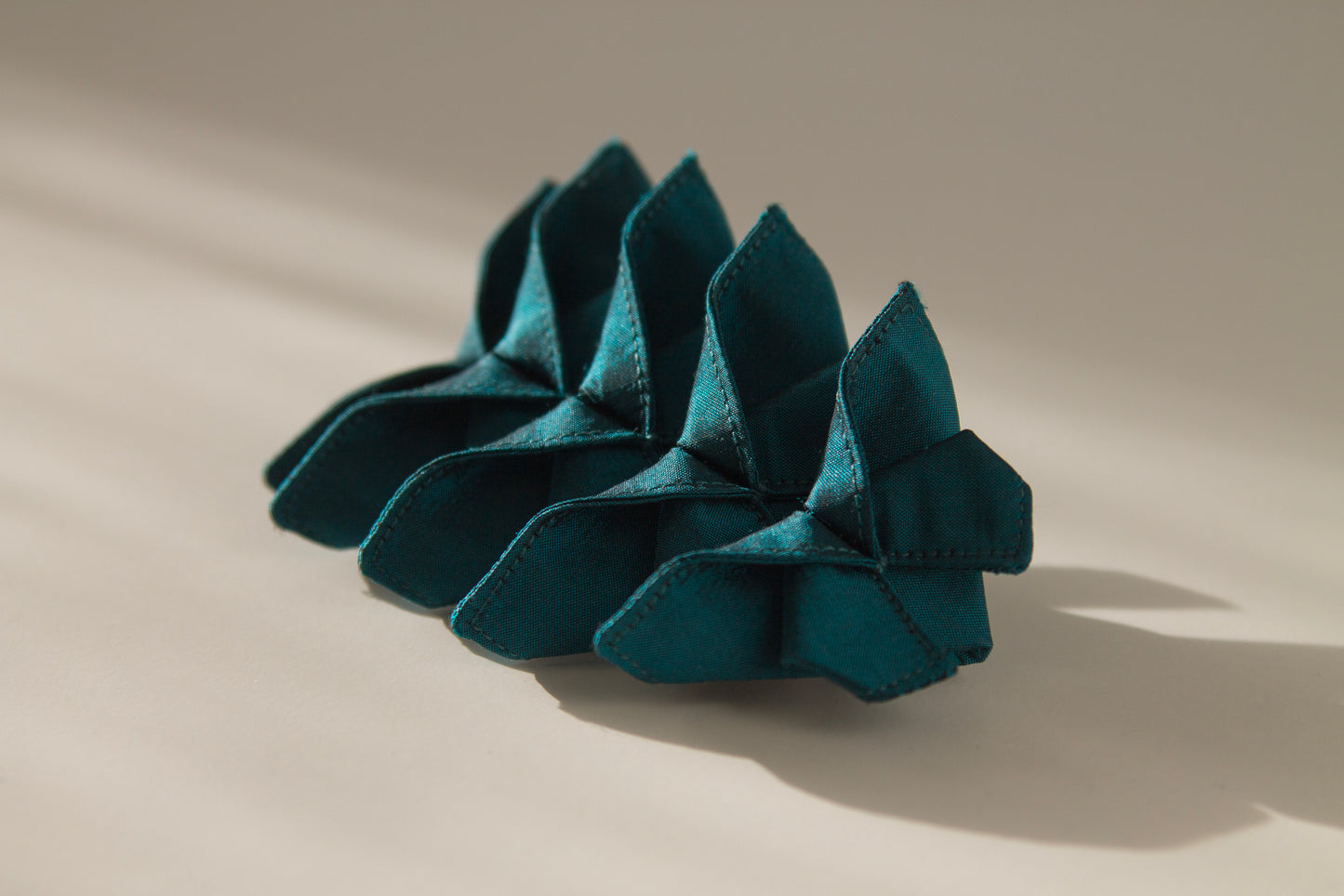 Origami Silk Butterfly Barrette Hair Clip in Dark Teal on white background.